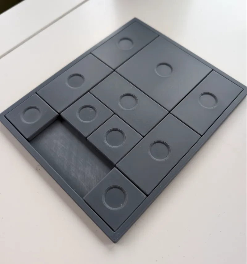 Tile sliding puzzle