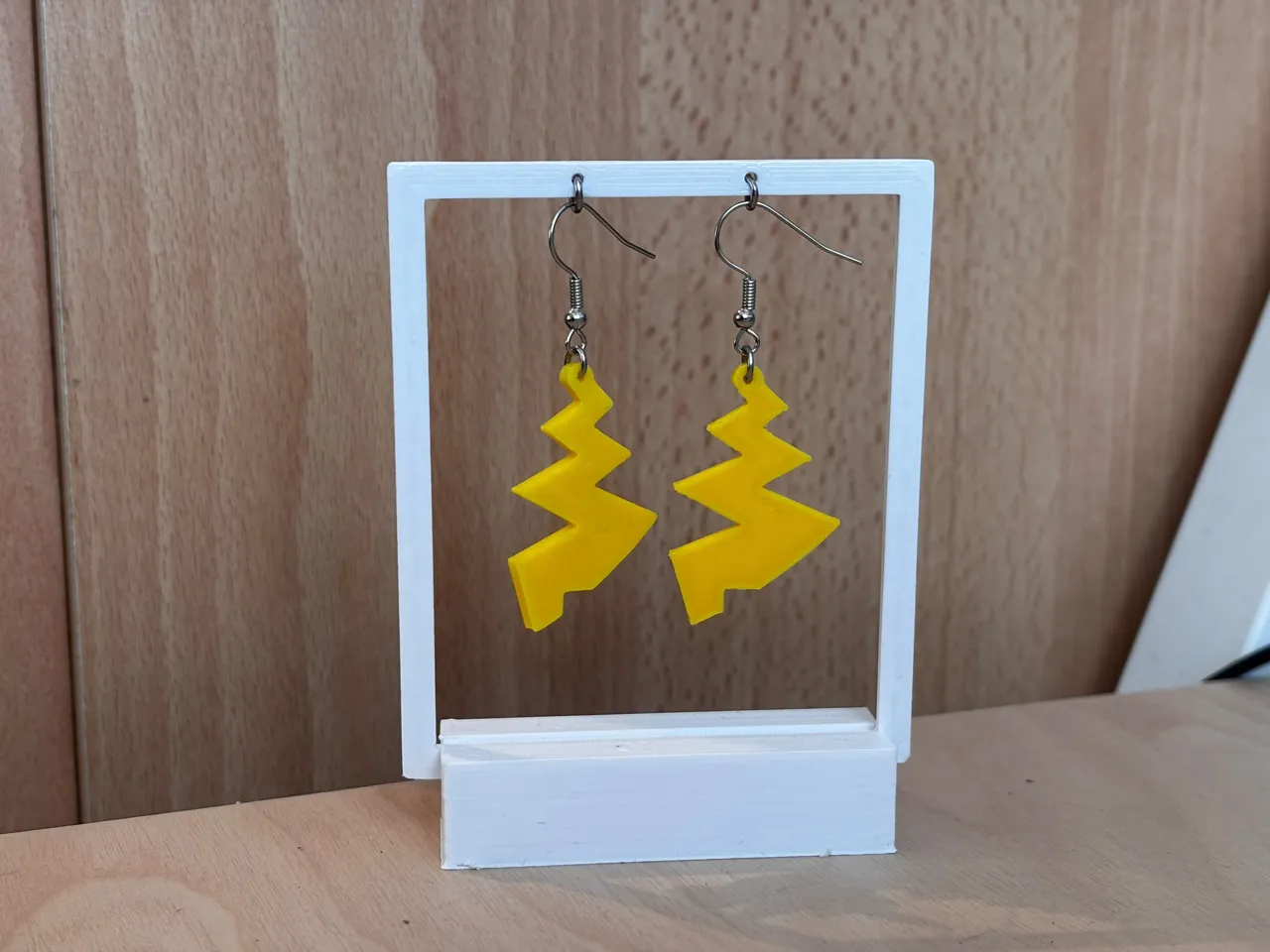 Pikachu tail earrings view 2