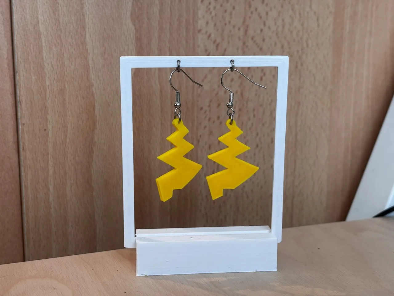 Pikachu tail earrings view 3
