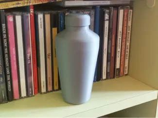Shaker-shaped shaker percussion