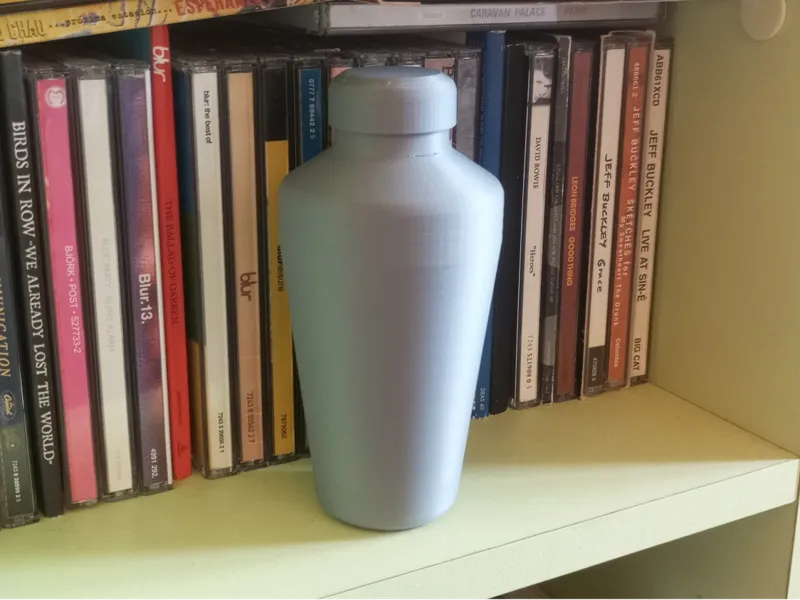 Shaker-shaped shaker percussion