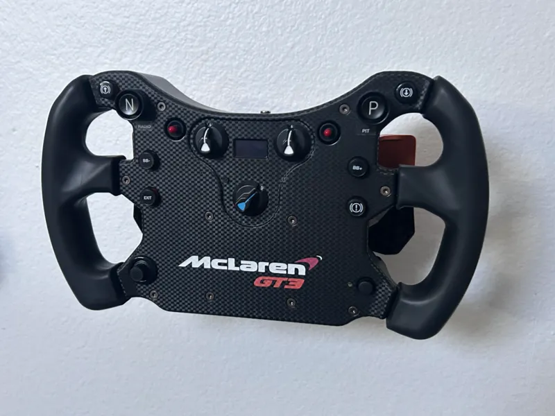 Fanatec mcleran gt3 wheel holder on wall