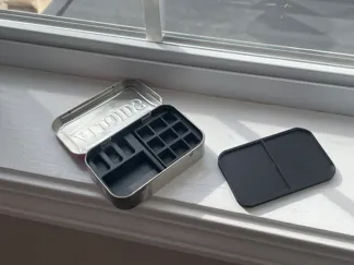 Mintipainting. A painting set in an altoid tin.