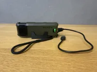 Flextail stand for charging to allow cable at bottom.