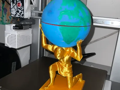 Music Box Atlas holding the world and rotating
