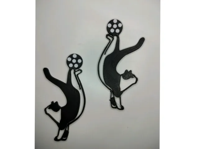 Acrobat cat with ball - stud earrings