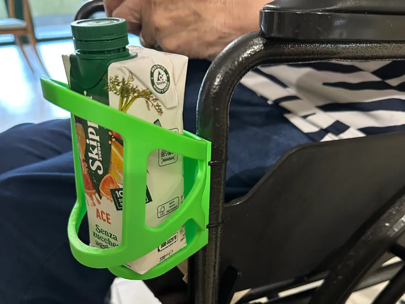 Wheelchair bottle holder (zip tie)