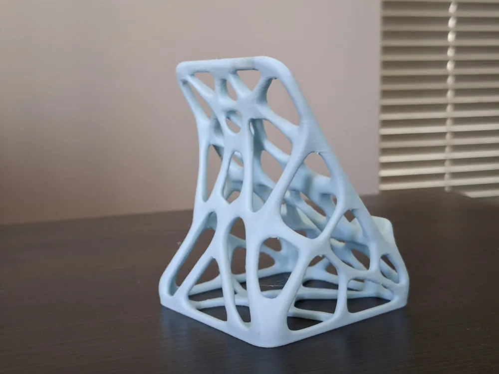 Organic design stand for phone or tablet - Free 3D Print Model - MakerWorld