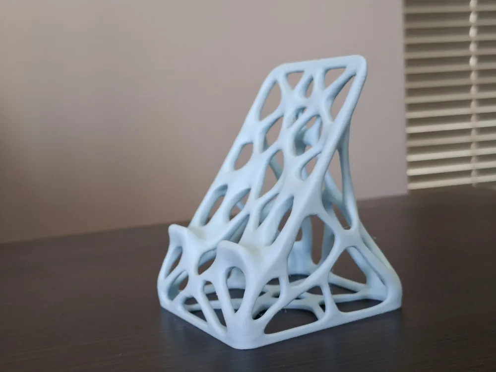Organic design stand for phone or tablet - Free 3D Print Model - MakerWorld