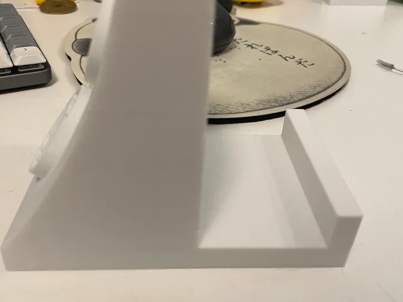 Warped Wall Phone Holder with UNAA and WNL