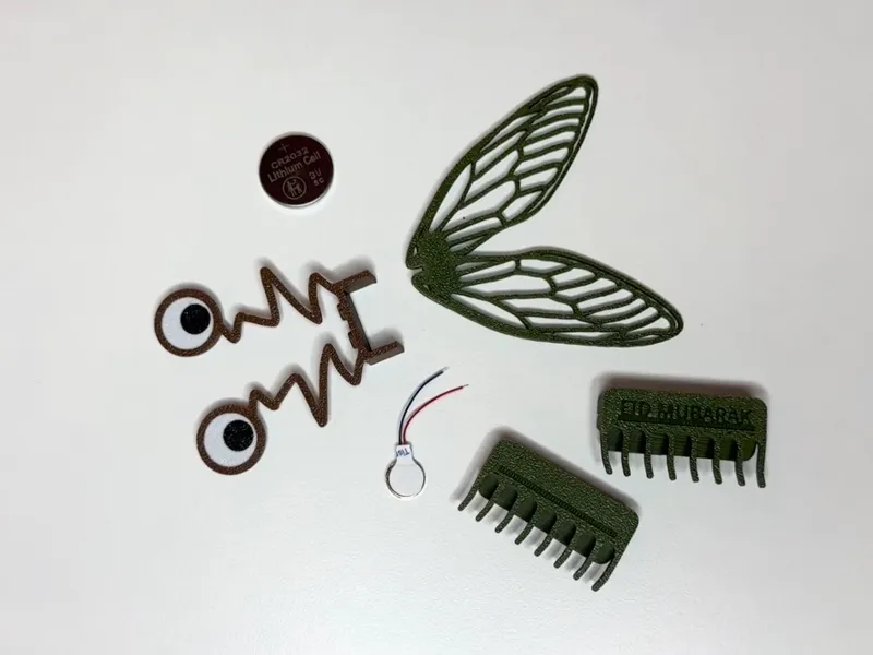 Cicada wings & googly eyes add-ons for scooterbot