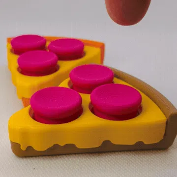 Objeto manipulable: NeeDoh Pizza Clicker Fidget Toy (<1.5 hrs) — vista de referencia 3