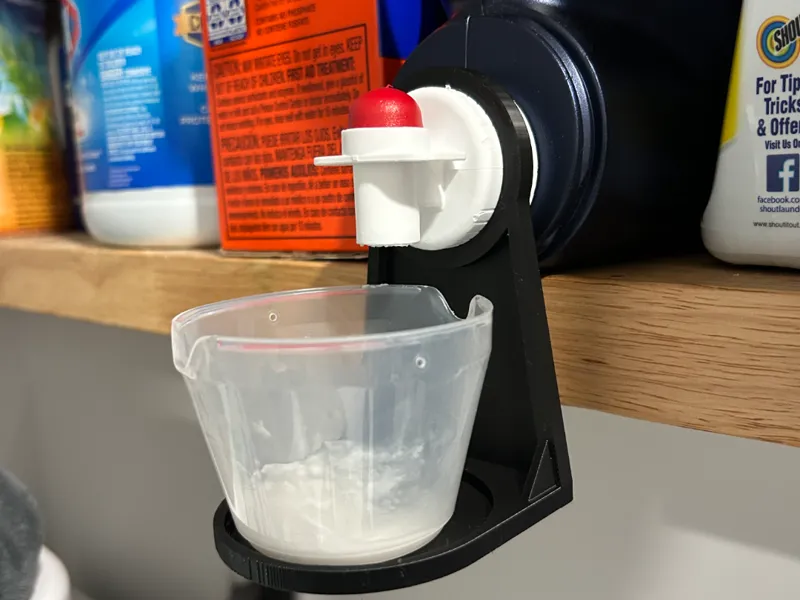 Laundry detergent cup holder