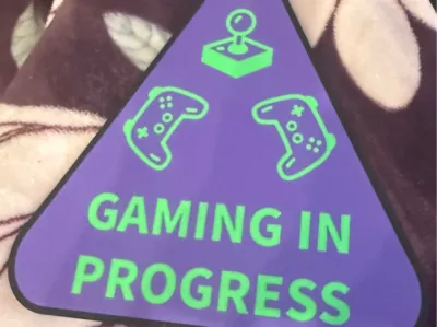 Gaming in progress door sign