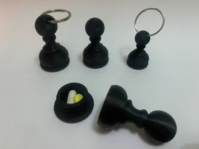 Chess pawn keychain and pill case