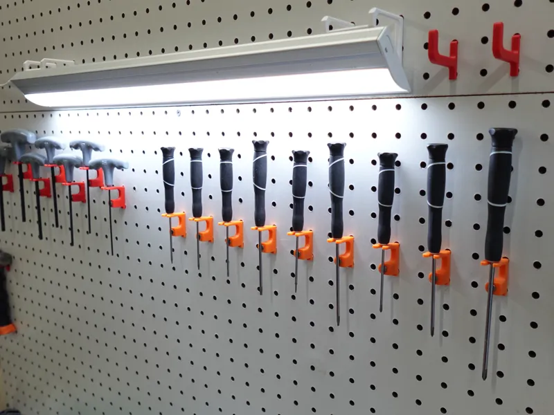 Magnet screw driver holder for pegboard