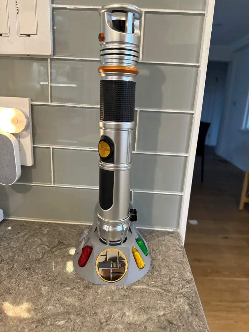 Lightsaber mount with kyber crystal and pins