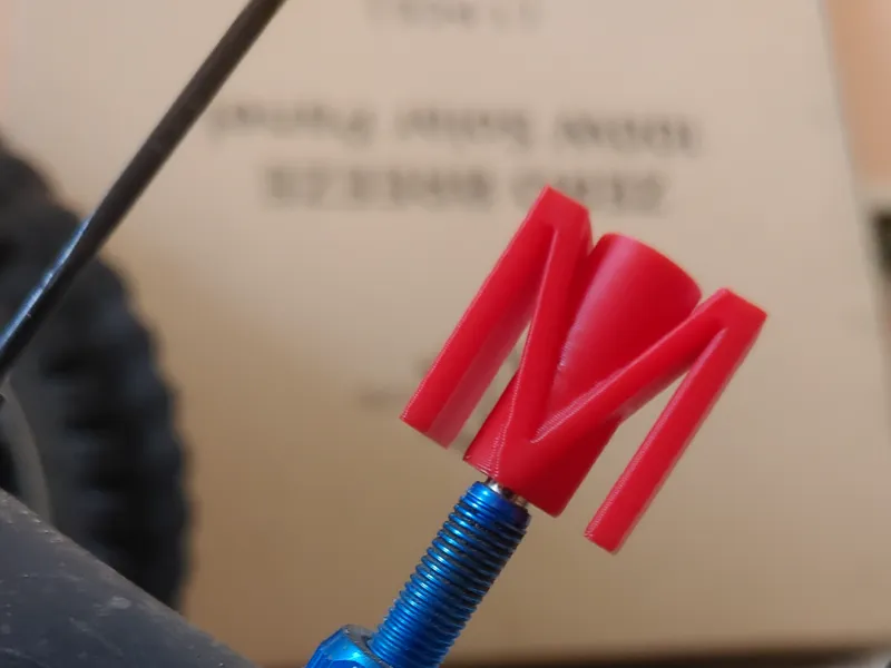 Letter M Valve Cap