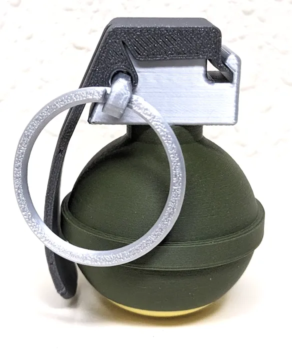 V40 Mini Grenade | World's Smallest| Flying handle view 3