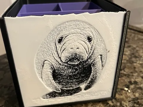 Manatee facing front Hueforge 100x100