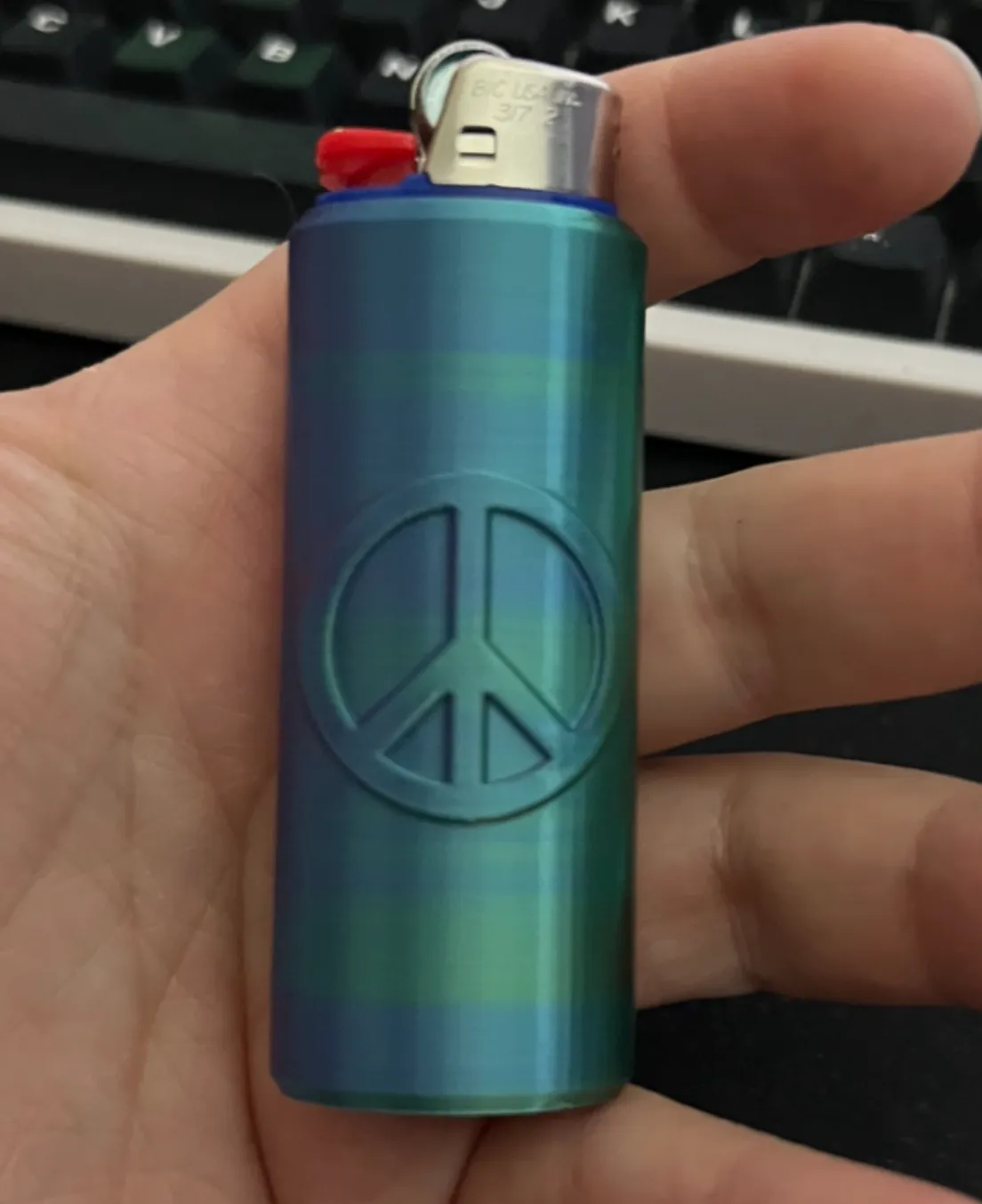 Étui briquet Bic signe paix