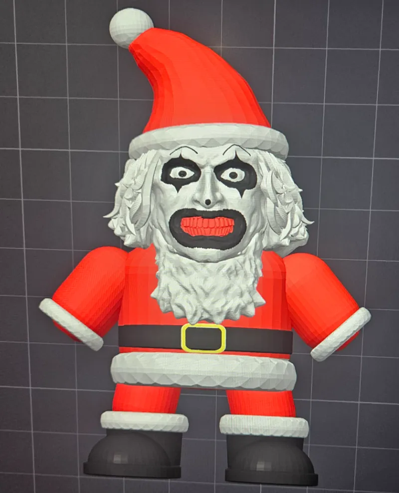 Art the clown in Santa Suit