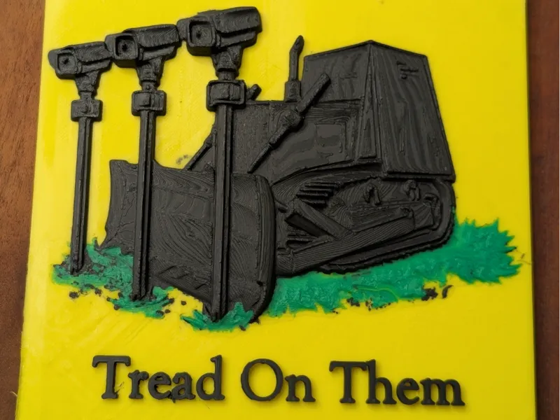 Tread On Them – Killdozer vs. Surveillance Sign