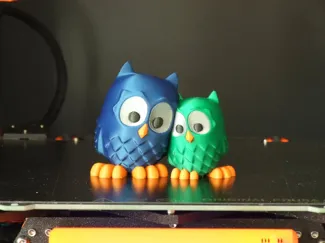 Cuddling Owls (multi-material)