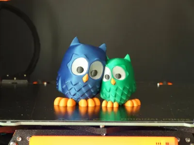 Cuddling Owls (multi-material)