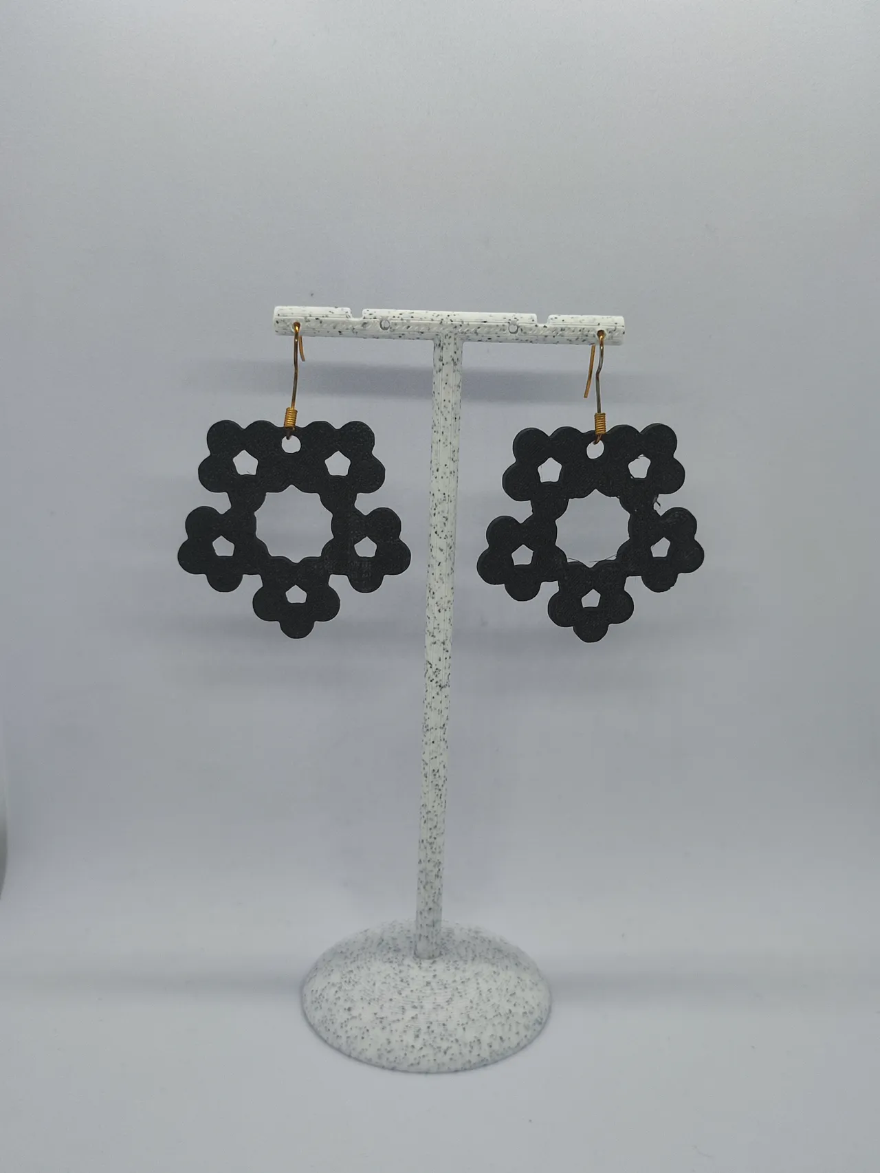 Aretes Flor Pentagonal view 2