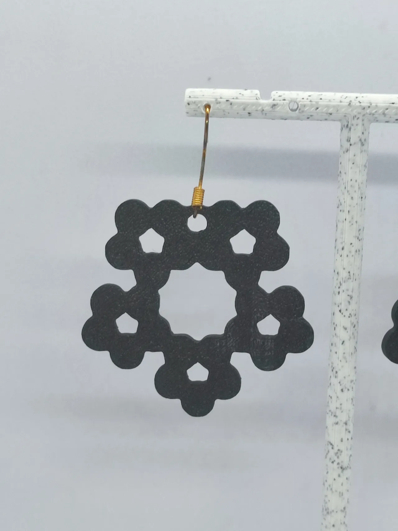 Aretes Flor Pentagonal view 4