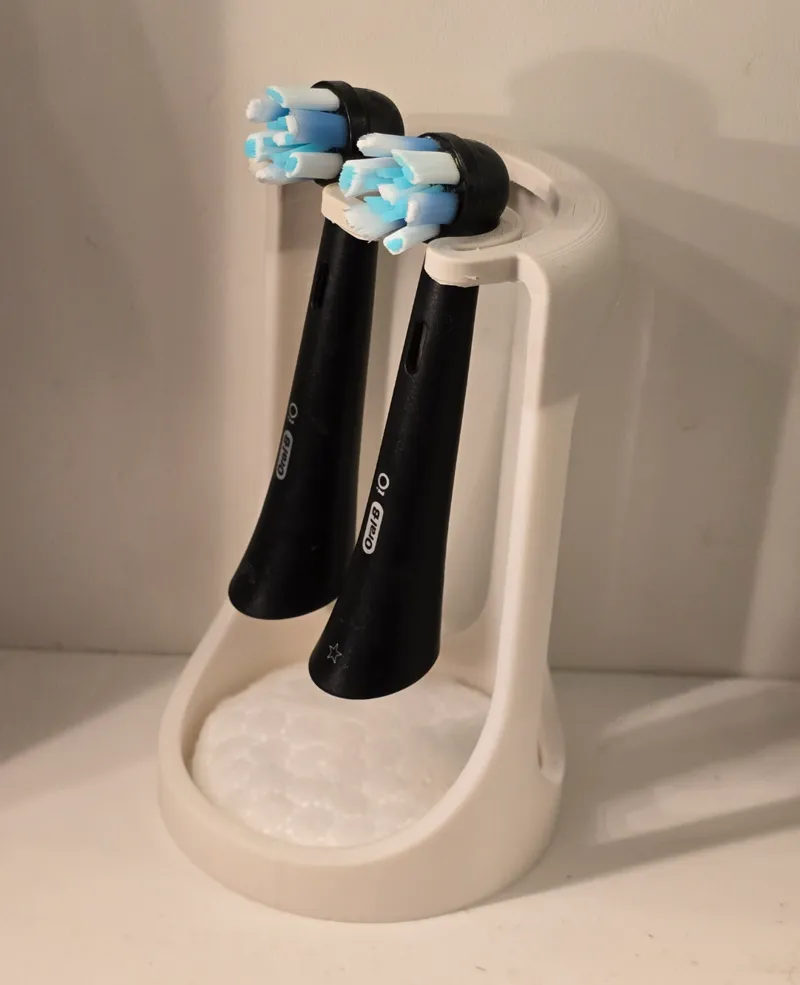 Stand for electric toothbrush heads