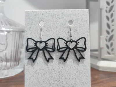 Aretes Heart of Ebony Bows
