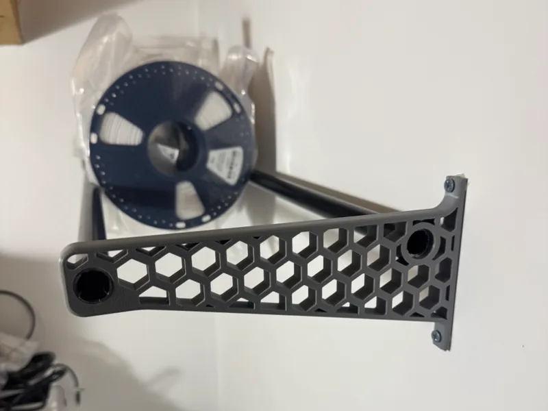 Wall holder for filament rolls