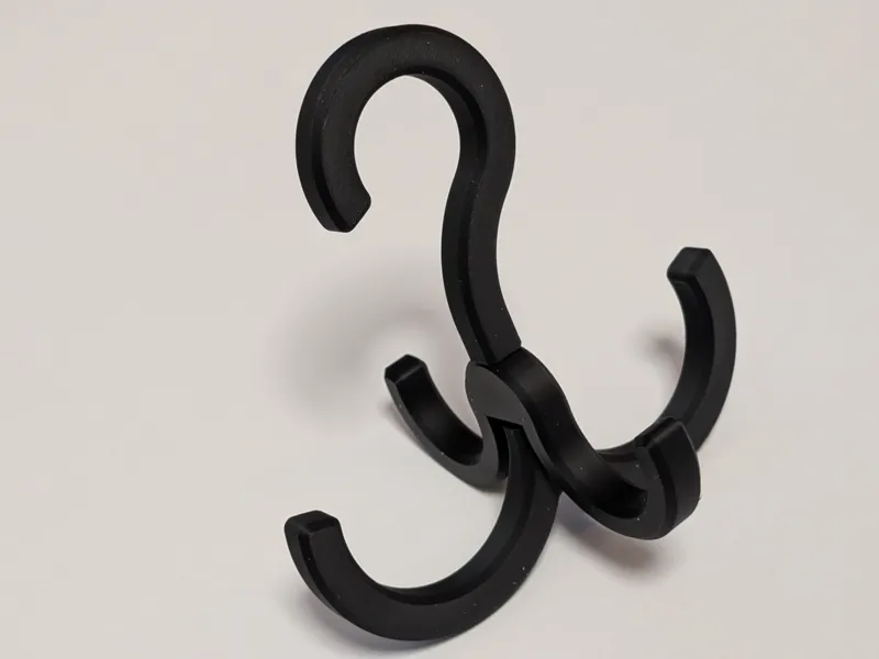 Folding quad hook hanger
