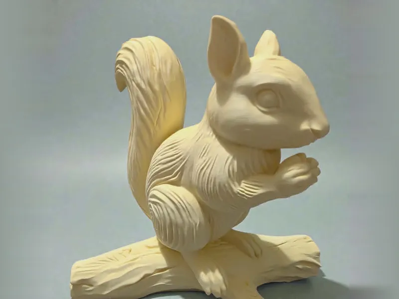 Squirrel on Branch Sculpture