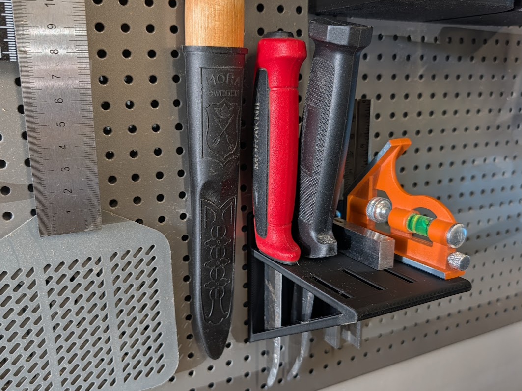 Pegboard holder for combination squares and knives