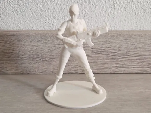 Fortnite girl character with gun