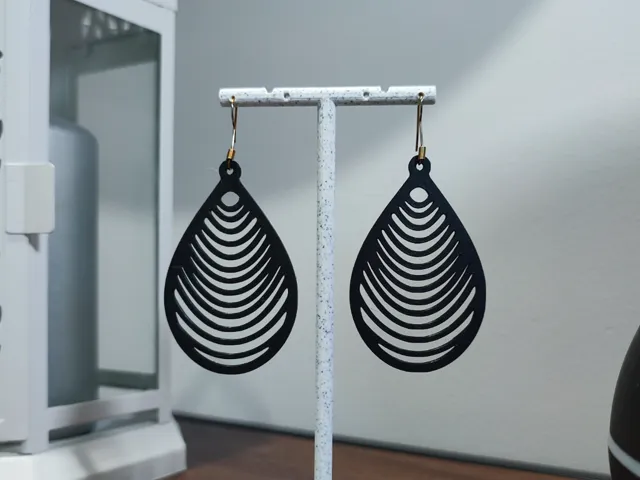 Aretes Ondas de Karma