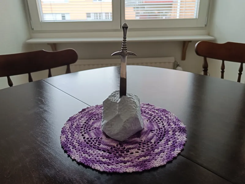 "Sword in the stone" holder for letter opener 