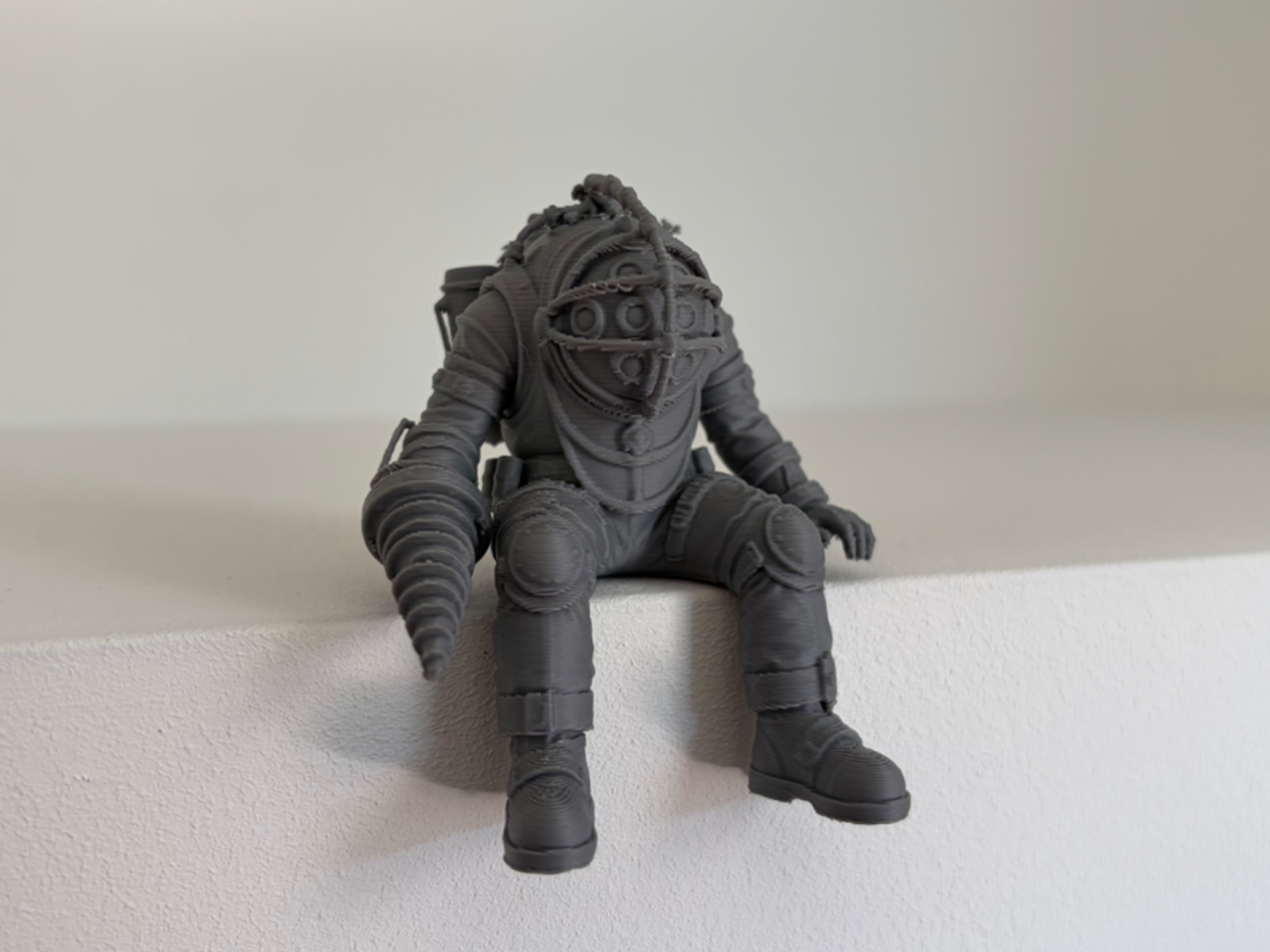 BioShock Big Daddy sitting on a Ledge shelf