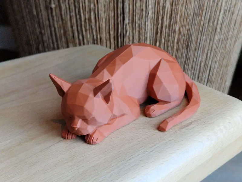 Low-poly sleeping cat