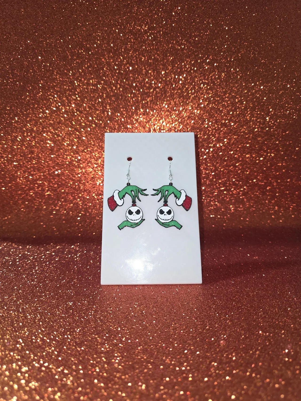 Jack Skellington on Grinch hand earrings view 2