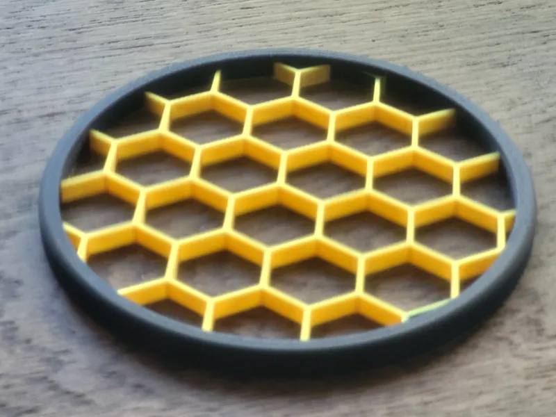 Coaster with honeycomb pattern AMS