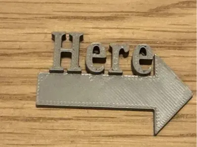 here arrow