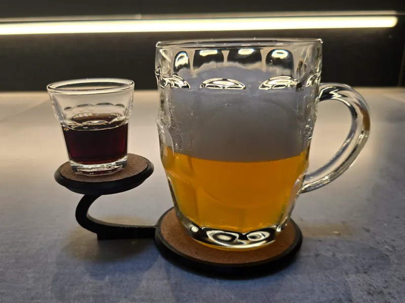 Coaster with shot pedestal