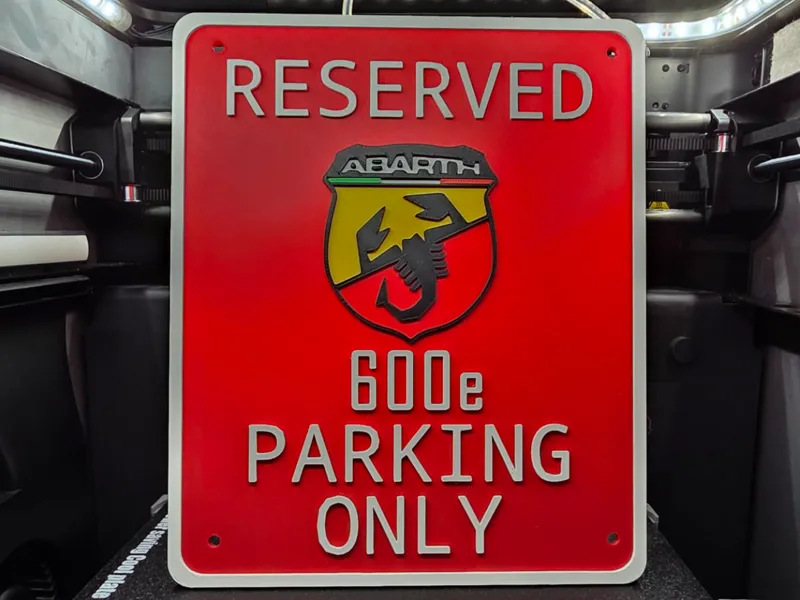 Reserved Abarth 600e parking sign