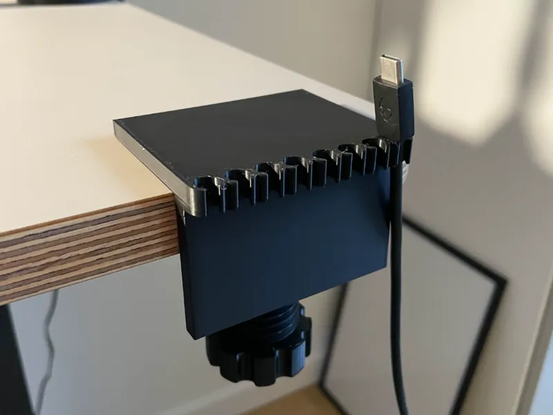 Cable manager variable size table clamp