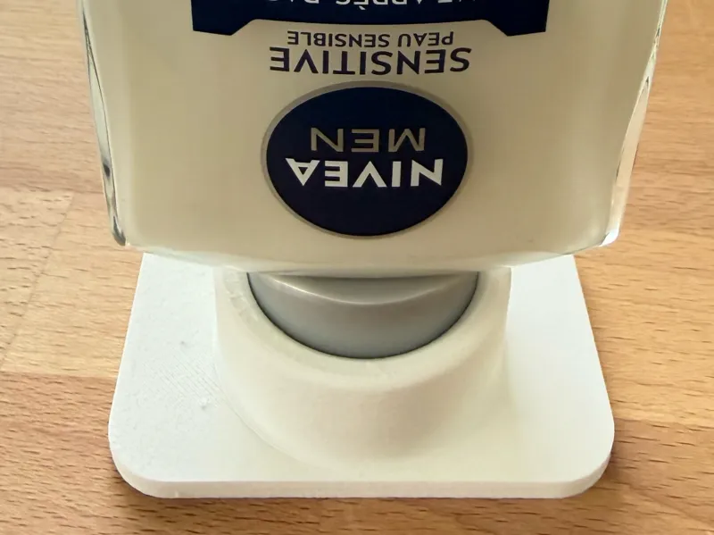 Upside down bottle stand Nivea After Shave Balm