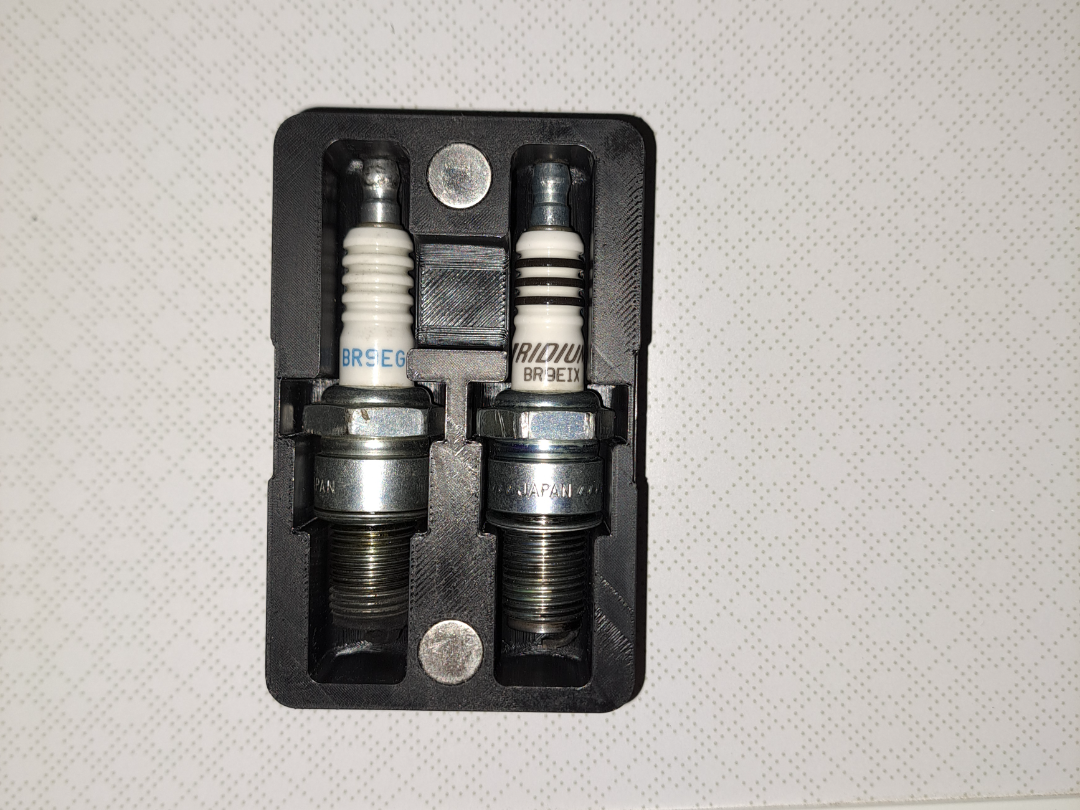Spark plug holder